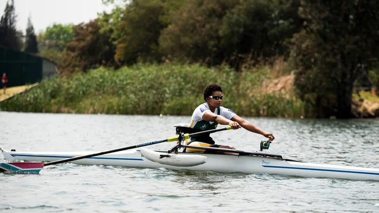 a man rowing a boat